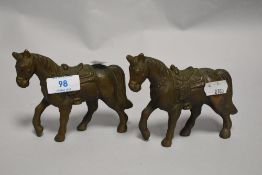 A pair of bronze cast Tang style horse figure studies.