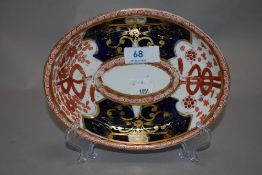 An antique meat dish marked Anstice Horton and Rose. Decorated in an Imari design.