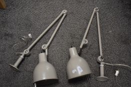 A pair of new desk top mounted engineers or craft workers adjustable lamps.