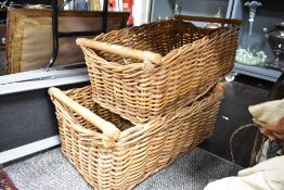 Two vintage wicker log or similar baskets.