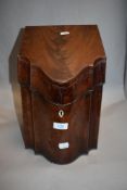 A Georgian Mahogany cased knife box with fitted interior.