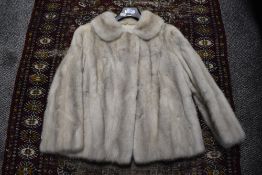 A vintage mid length ladies light fur co