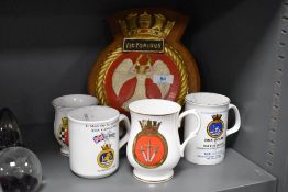 Four Barrow ship building related cups with a vintage Victorious plaque.