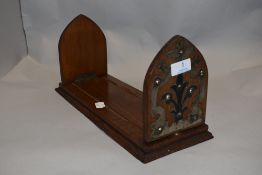 A late Victorian extending book with a French Gothic style design.