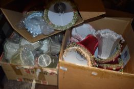 A large collection over four boxes of vintage mid century kitsch clip on light shades.