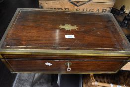 An early Victorian large sized writers slope having Rose wood and brass banded case with hidden