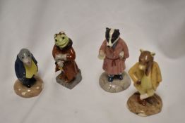 Four John Beswick Wind in The Willows figures including Toad WIW2, Badger WIW 3, Mole WIW 5 and