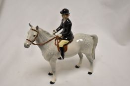 A Beswick figure study Huntswoman On Grey Dapple Horse Style 2 HN 1730