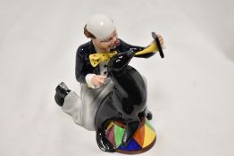 A Royal Doulton figure study of a Clown Partners HN 3119
