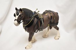 A Beswick animal study a Shire Horse Clydesdale in Show Harness HN 2465,