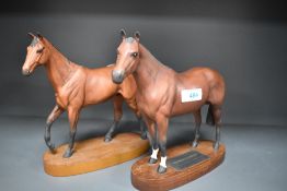 A Beswick large thoroughbred 1772 and a Royal Doulton Red Rum style Two A226 marked as second.