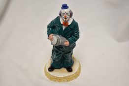 A Royal Doulton figure study of a Clown Will He Won't He, HN3275