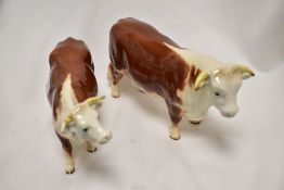 A Beswick Hereford Earl cattle Bull 949 and cow 948 second version.