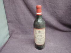 A bottle of John Harvey & Son Limited Chateau Ducru Beaucaillou St Julien 1964 Red Wine, no strength