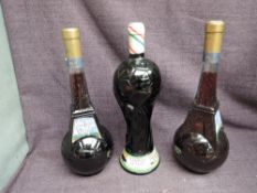 A bottle of Italian 1990 World Cup Caldirola Barbera D'Asti 12% vol 0.75L along with two bottles