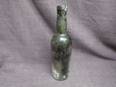 A bottle of 1955 Quinta do Noval Vintage Port, wax seal unreadable, Label missing, slight seepage,