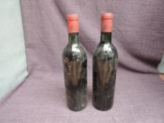 Two bottles of French Red Wine, no label, cork enclose states Mis En Bouteille, Leoville Las