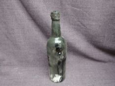 A bottle of 1955 Quinta do Noval Vintage Port, wax seal unreadable, Label missing, slight seepage,