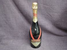 A bottle of Mumm & Co Grand Cordon 1990 Champagne, 12.5% vol, 750ml, been laid down in cellar