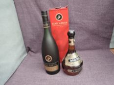 A bottle of Remy Martin VSOP Fine Champagne Cognac, 40% vol, 1 litre in card box along with a bottle