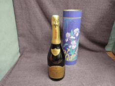 A bottle of Hervé Hudelet Rizaucourt 1996 Champagne 12% vol, 750ml, in card tube