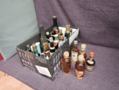 A small collection of Alcoholic Miniatures including Gordon's Lemon Gin 60 proof and Bronz