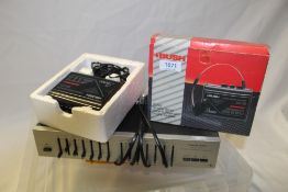 A vintage Bush boxed walkman and a Realistic seven band equalizer - two retro pieces on offer here