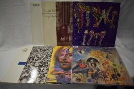 Eight 80's rock and pop albums including Tears for fears, Pet Shop Boys, George Michael and more.
