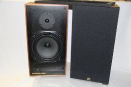 A pair of Monitor Audio R252 cherry wood cased speakers in excellent condition