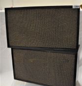 A pair of vintage Tandberg TL120 book shelf speakers with a wonderful retro look to them