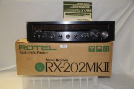 A boxed Rotel RX 202 MK II - amplifier and receiver - a nice condition vintage piece and a Rotel
