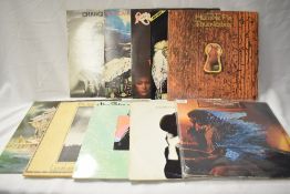 A lot of ten Rock and pop albums Lou Reed, David Bowie etc.