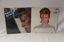 A lot of two David Bowie albums including a Lifetimes pressing - both in VG+