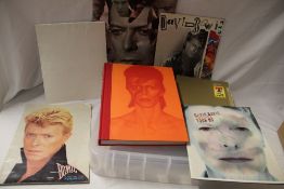 A box of David Bowie related paper good with rare programmes on offer here as well as magazines