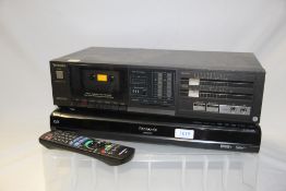 A technics cassette deck and panasonic dvd recorder with remote