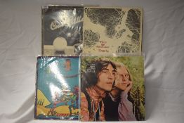 Four Uk folk albums including two Incredible String band and Donovan Cosmic Wheels with circular