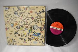 A VG+ / VG original Led Zeppelin 3 purple and red Atlantic label, sleave in good condition.