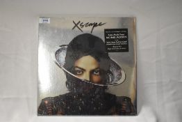 A copy of Michael Jacksons Xscape unopened on Epic label.