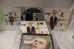A selection of David Bowie albums with limited editions and seven inch singles on offer here - the