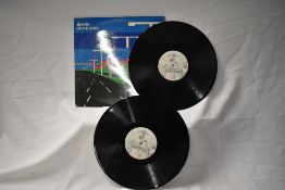 A copy of Traffic on the Road double live album on Island label. VG.