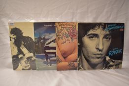 Two Bruce Springsteen and two Super Tramp albums.