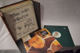 A box of 12 inch 90's dance and rap singles.