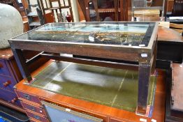A modern coffee table with a printed design of London.
