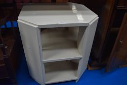 An Art Deco style painted side table.