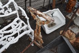 A Victorian cast iron table base in a Coalbrookdale style.
