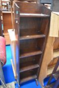 A small Edwardian oak book shelf.