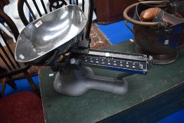 A set of vintage kitchen or chefs adjustable balance scales.