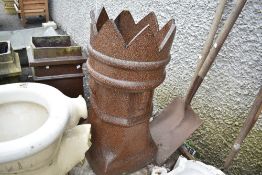 A vintage queen style chimney pot.