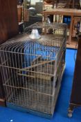 Two early 20th century bird cages.