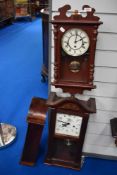 Three reproduction wall clocks